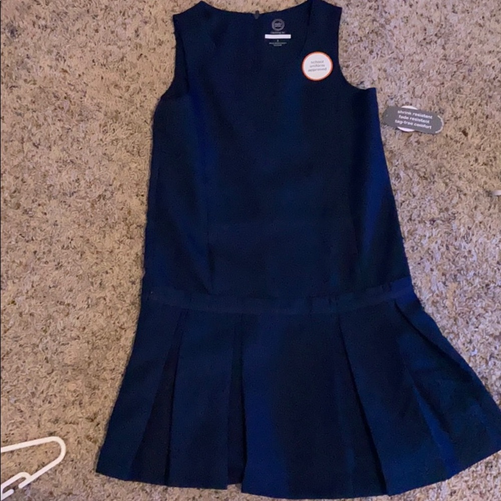 A navy uniform dress  its school uniform approved.